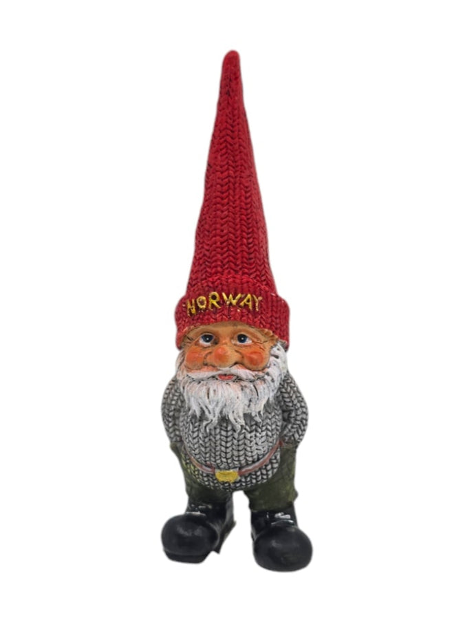 The Nisse Man with Tall Hat figurine stands 5 inches tall, featuring a tall red hat labeled Norway, a gray sweater, and green pants against a white background.