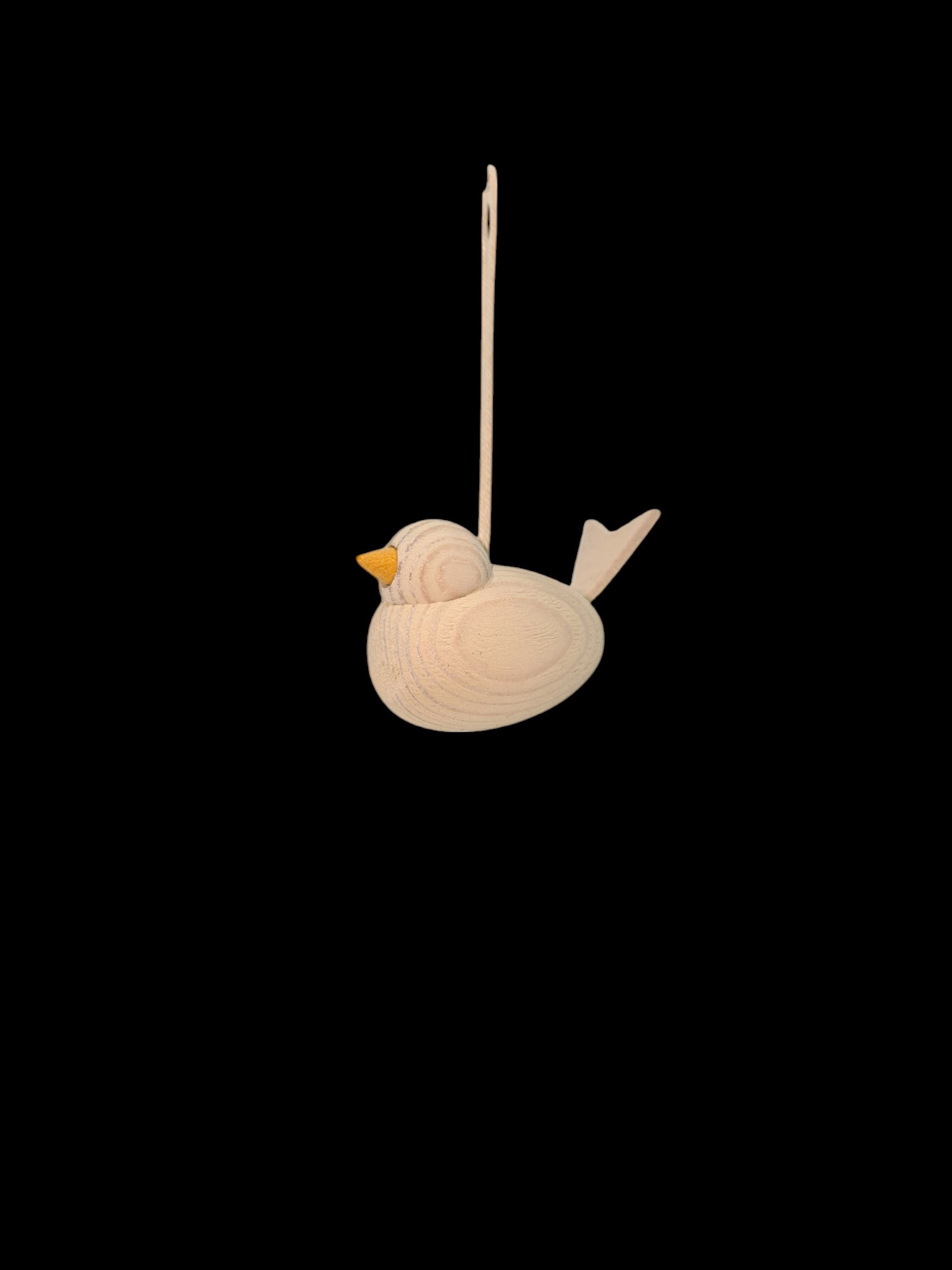 This delightful Ornament: Wooden Scandi Bird White Christmas Tree Ornament is crafted in Sweden from white wood and comes with a string for easy hanging. Its elegant design stands out beautifully against a black background, making it an ideal addition to your Christmas tree decor.