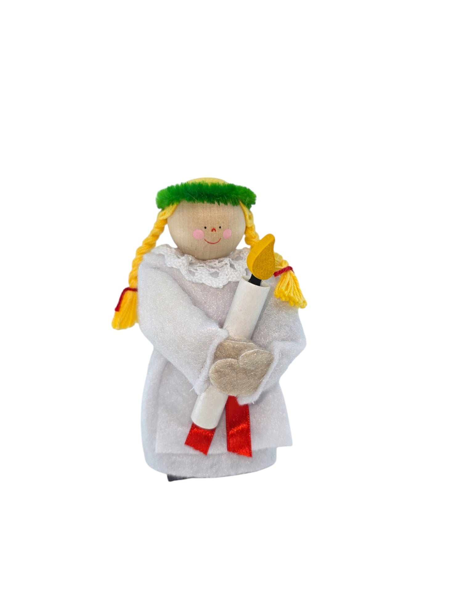 This exquisite St Lucia Hand-crafted Wood Figurine, approximately 5" tall, depicts a girl with braided hair wearing a white gown and a green headdress while holding a candle. It beautifully celebrates the St Lucia Christmas holiday tradition.