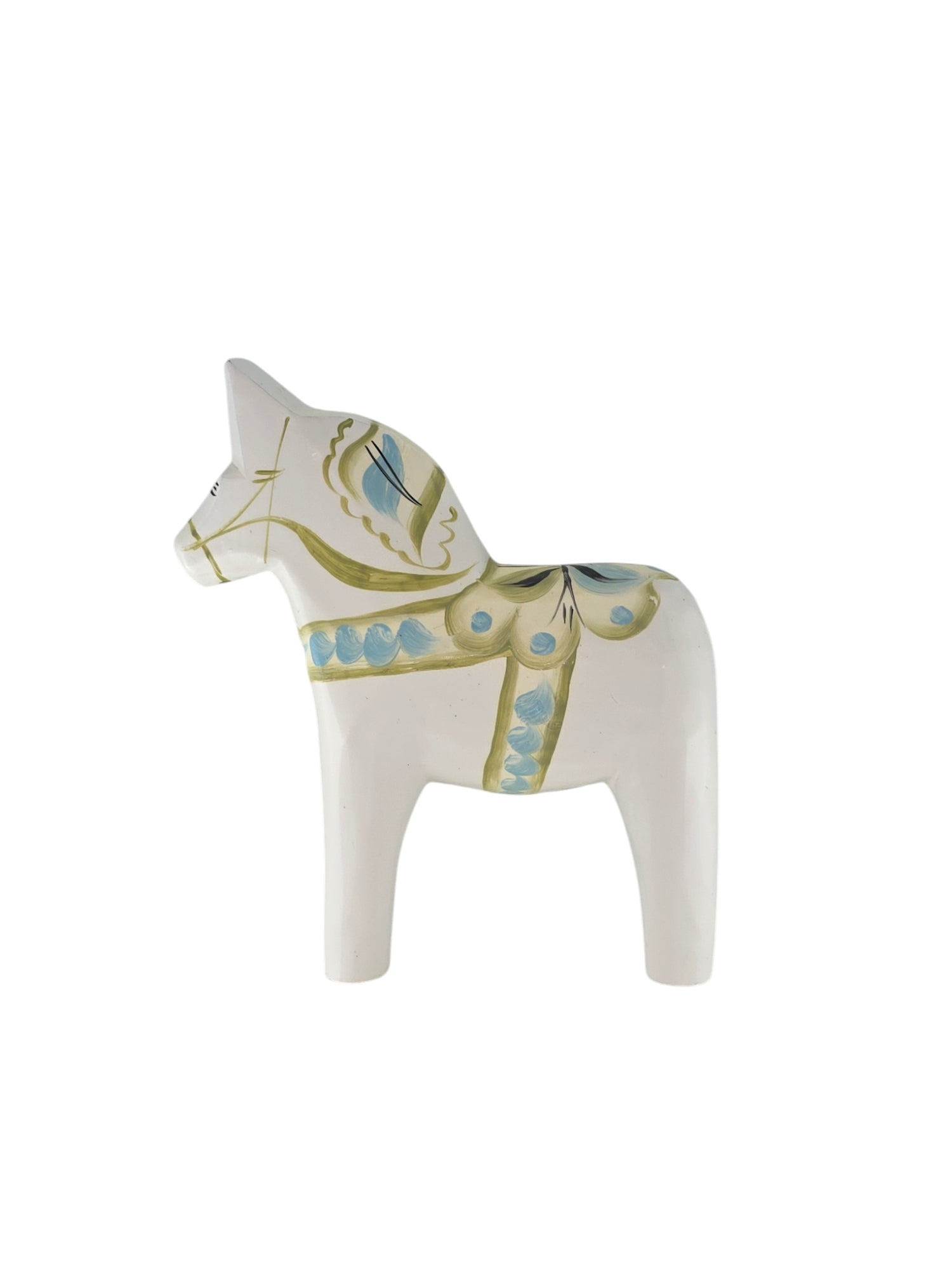 The Dala Horse: Pastel on White Swedish Dala Horse with Kurbits figurine features exquisite blue and gold decorative patterns. Its hand-painted details add elegance to its timeless design, reminiscent of a classic Swedish Dala Horse in white ceramic.