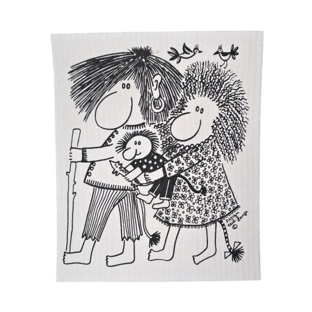 The Trolls by Heidi Lange dish cloth features a charming black and white illustration of a smiling cartoon family of three holding hands with birds above, adding an eco-friendly Swedish charm to your kitchen decor.