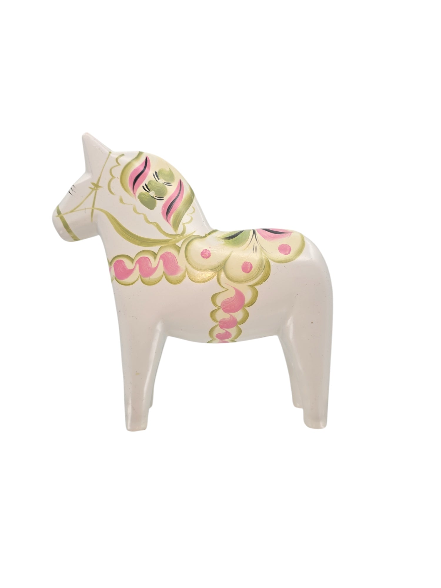 The Dala Horse: Pastel on White Swedish Dala Horse with Kurbits is beautifully hand-painted, featuring pink and green floral patterns against a plain background, highlighting its intricate artistry.