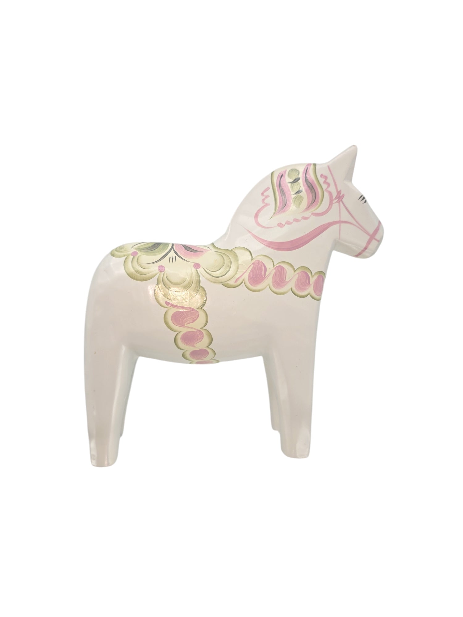 A hand-carved Dala Horse: Pastel on White Swedish Dala Horse with Kurbits, exquisitely hand-painted in white, pink, and green with decorative patterns, viewed from the side.