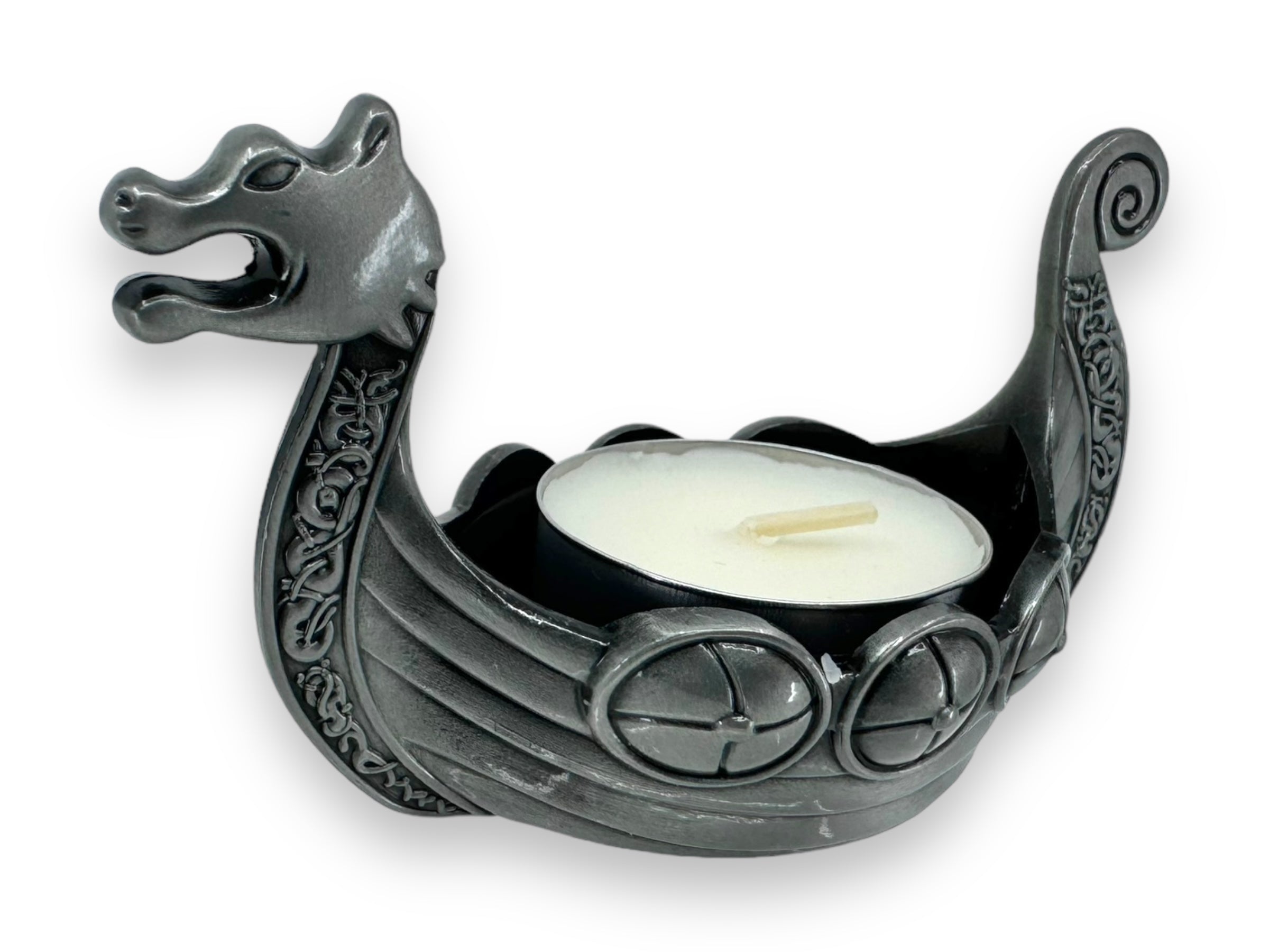 The Candle Holder: Dragon Head Pewter Viking Ship w/Tea Light Candle is expertly crafted in a Viking ship shape with a fierce dragon head, elegantly cradling a tea light candle.