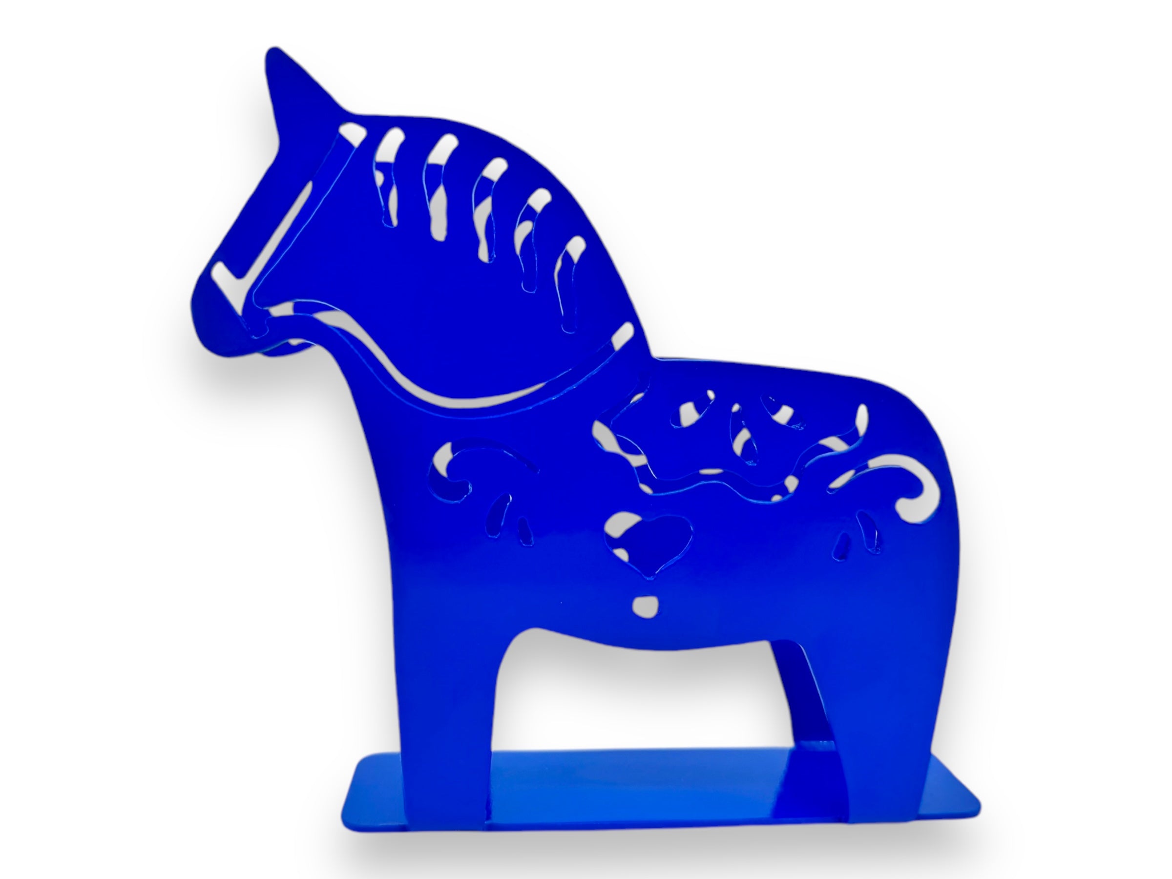 The intricate Laser Cut Metal Dala Horse napkin holder features a blue abstract horse silhouette with patterned cutouts, standing gracefully on a flat base.