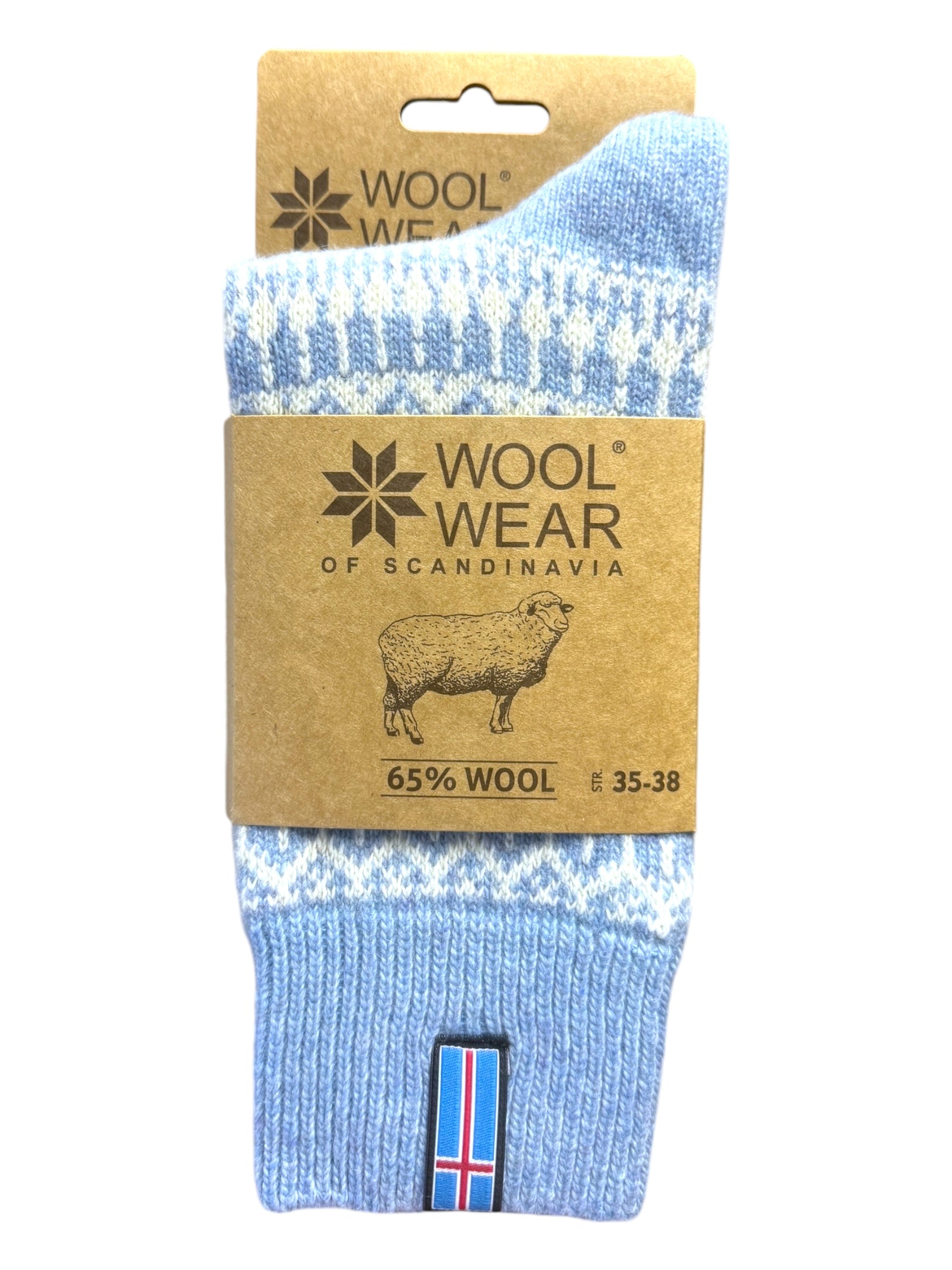 These cozy light blue wool socks, featuring a Nordic pattern and the Icelandic flag, are perfect for embracing warmth. The packaging label proudly reads "Wool Wear of Scandinavia," crafted with 60% wool and available in size 35-38.