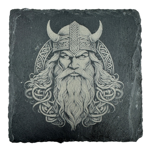 Engraved image of a Viking warrior with horned helmet and beard on a square slate coaster. The design, from the Coaster: Warrior, Viking Head - Celtic Viking Symbol Slate Coaster, is inspired by Norse mythology and Celtic Viking symbols.