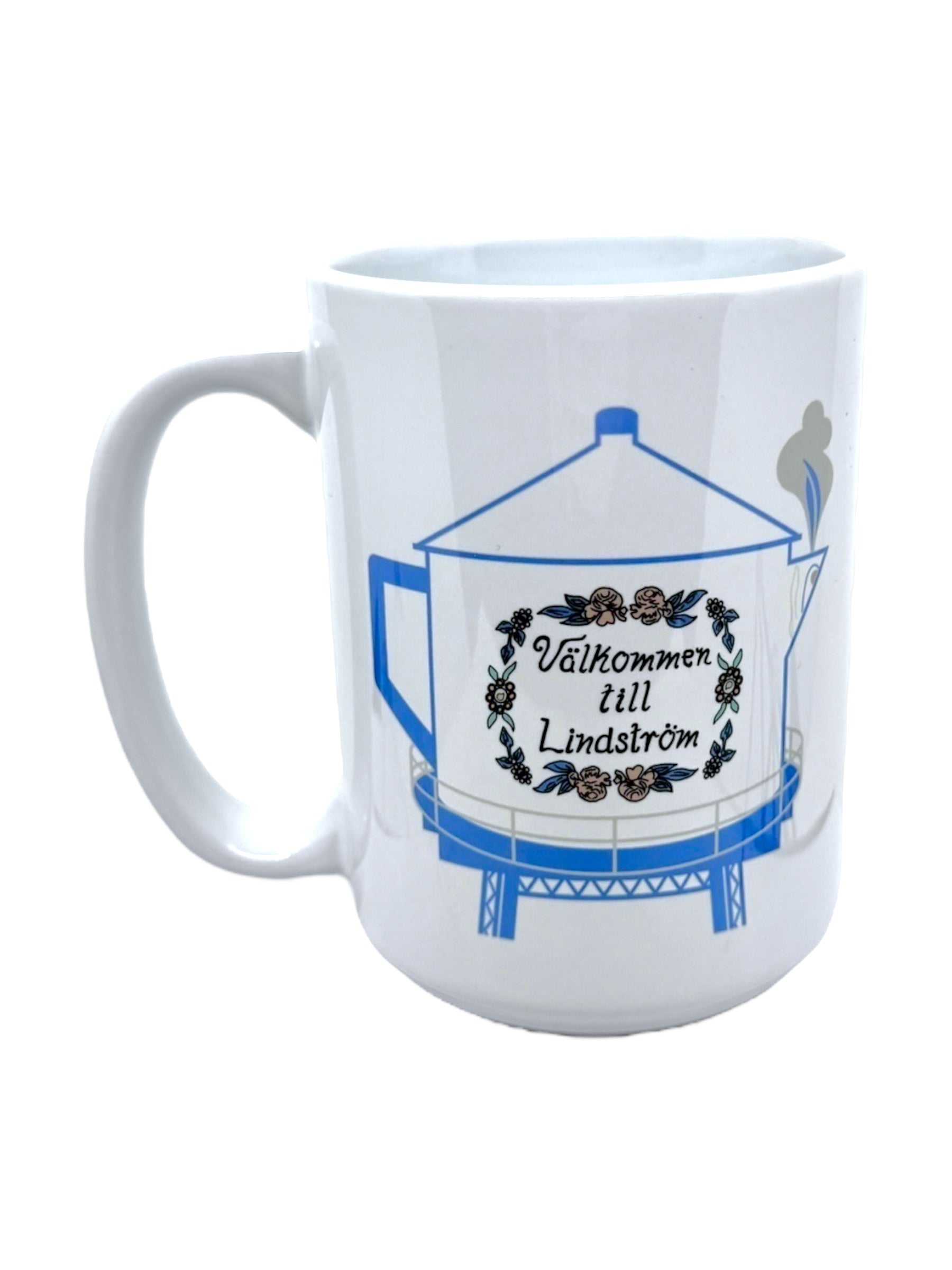 15oz ceramic mug featuring a blue Swedish coffee pot water tower illustration with Välkommen till Lindström in a decorative wreath, inspired by Americas Little Sweden and the iconic Lindström Water Tower.
