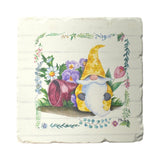 The Coaster: Spring Tomte - Gnomes Tumbled Tile Coaster Set features yellow-hatted gnomes, purple flowers, a pink tulip, and a red flowerpot on a leafy border. Set of 4 square 4" absorbent stone coasters with cork backing. Perfect for spring décor!.