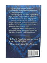 Back cover of "The Crucified Lady: an Inspector Adams Mystery"—follow Inspector Jeremy Adams of Scotland Yard as he investigates a murder, in this novel by UK-born author Robert McDowell, now living in Minnesota.