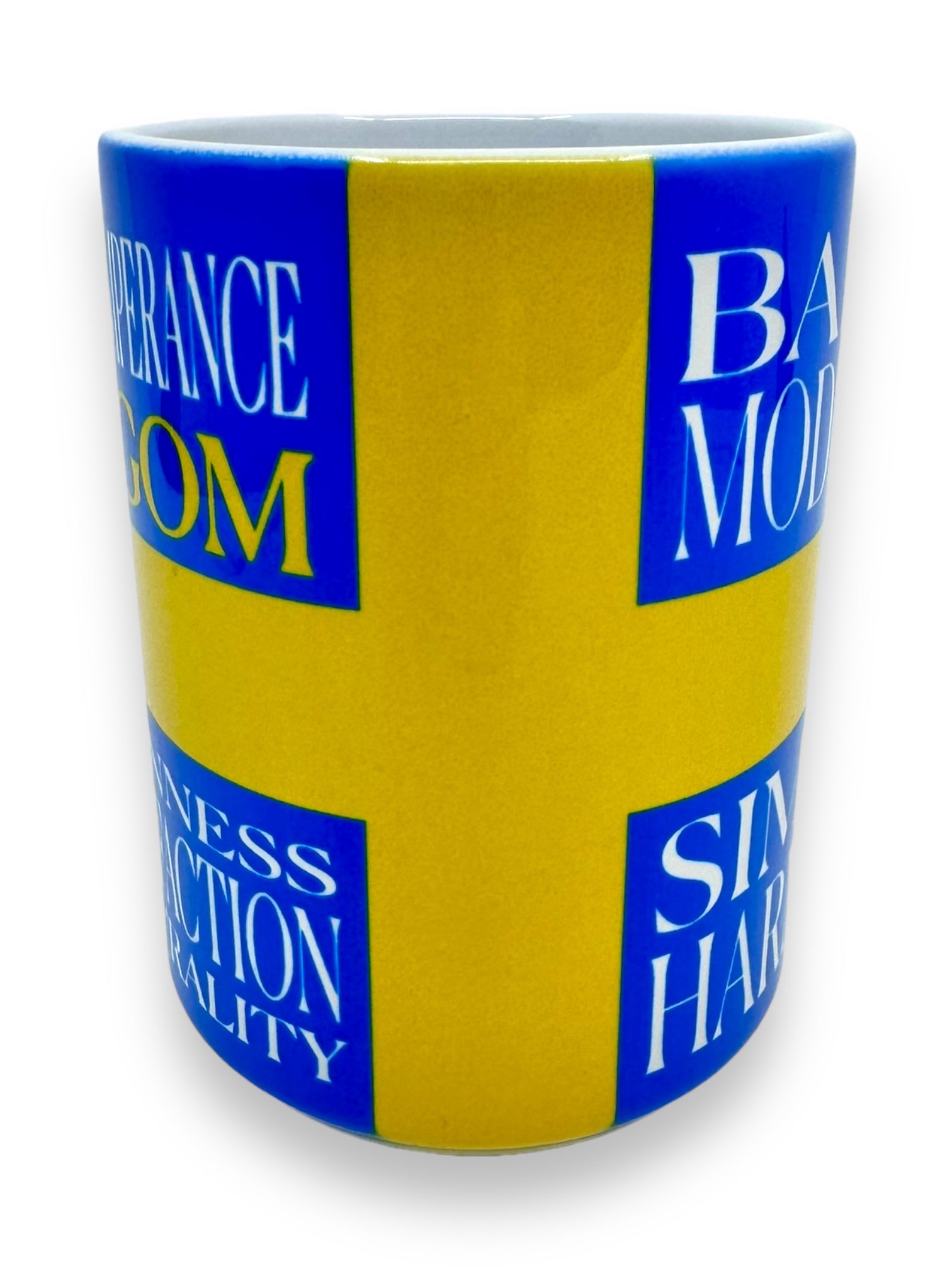 This ceramic mug, available in a lovely blue and yellow color scheme, embodies the Swedish concept of Lagom with words like Temperance, Wisdom, Modern Baking, Skill Harmony, Business Action Reality. It's named the "Mug: Scandinavian Motto 'Lagom'" and holds 15oz.