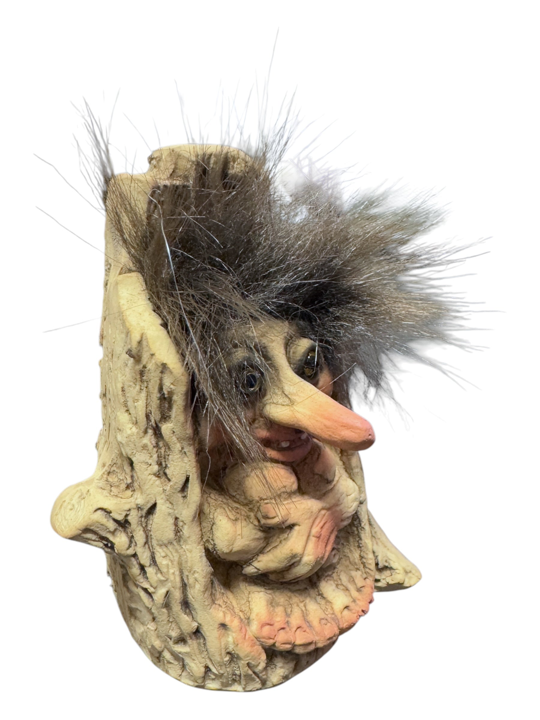 A small NyForm Troll in a tree stump, featuring a long nose and wild gray hair reminiscent of Norwegian design, makes for an enchanting presence, ideal as a collectors item.