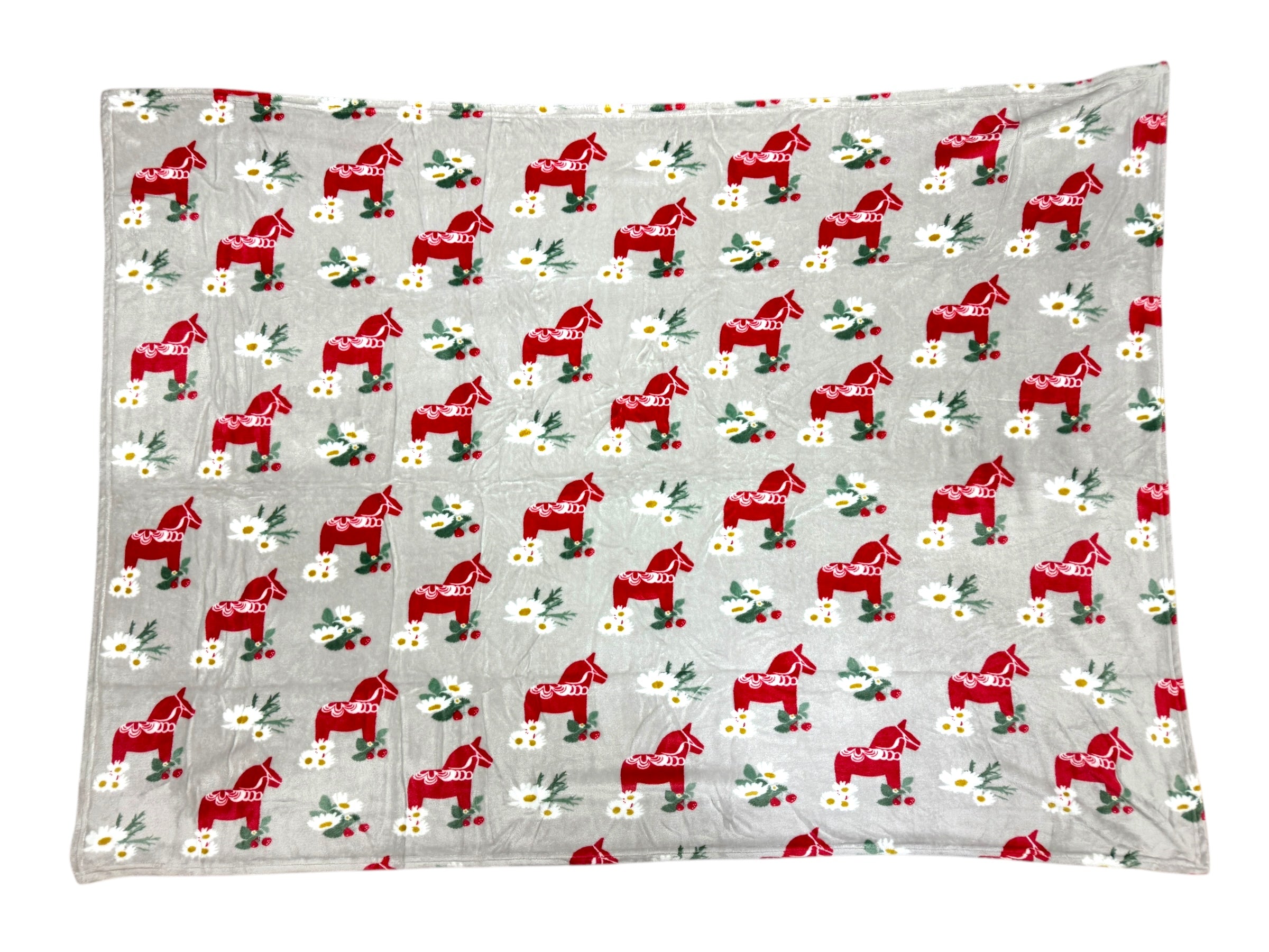 The Blanket: Fleece Red Dala Horse, Beige/Light Gray is a light gray fleece blanket with red Dala horses, white flowers, and green leaves in a repeating pattern.