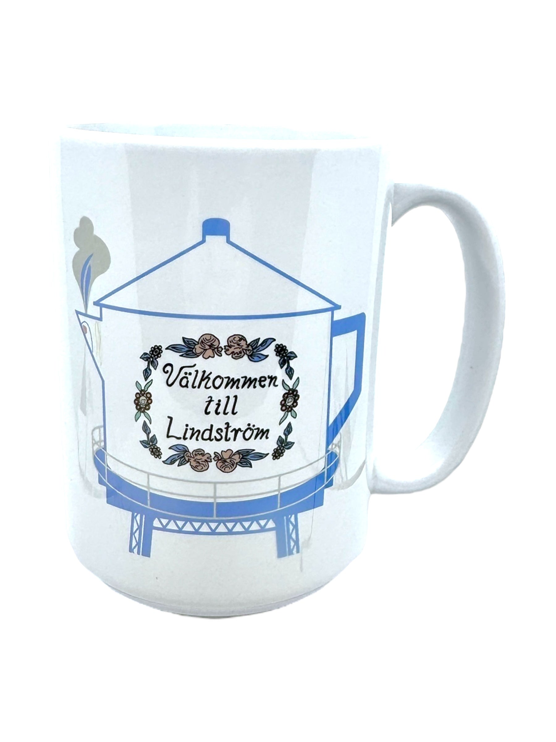 The 15oz Valkommen to Lindström Swedish Coffee Pot Water Tower Mug features the water tower and floral accents with Välkommen till Lindström in Swedish—a delightful homage to America’s Little Sweden.