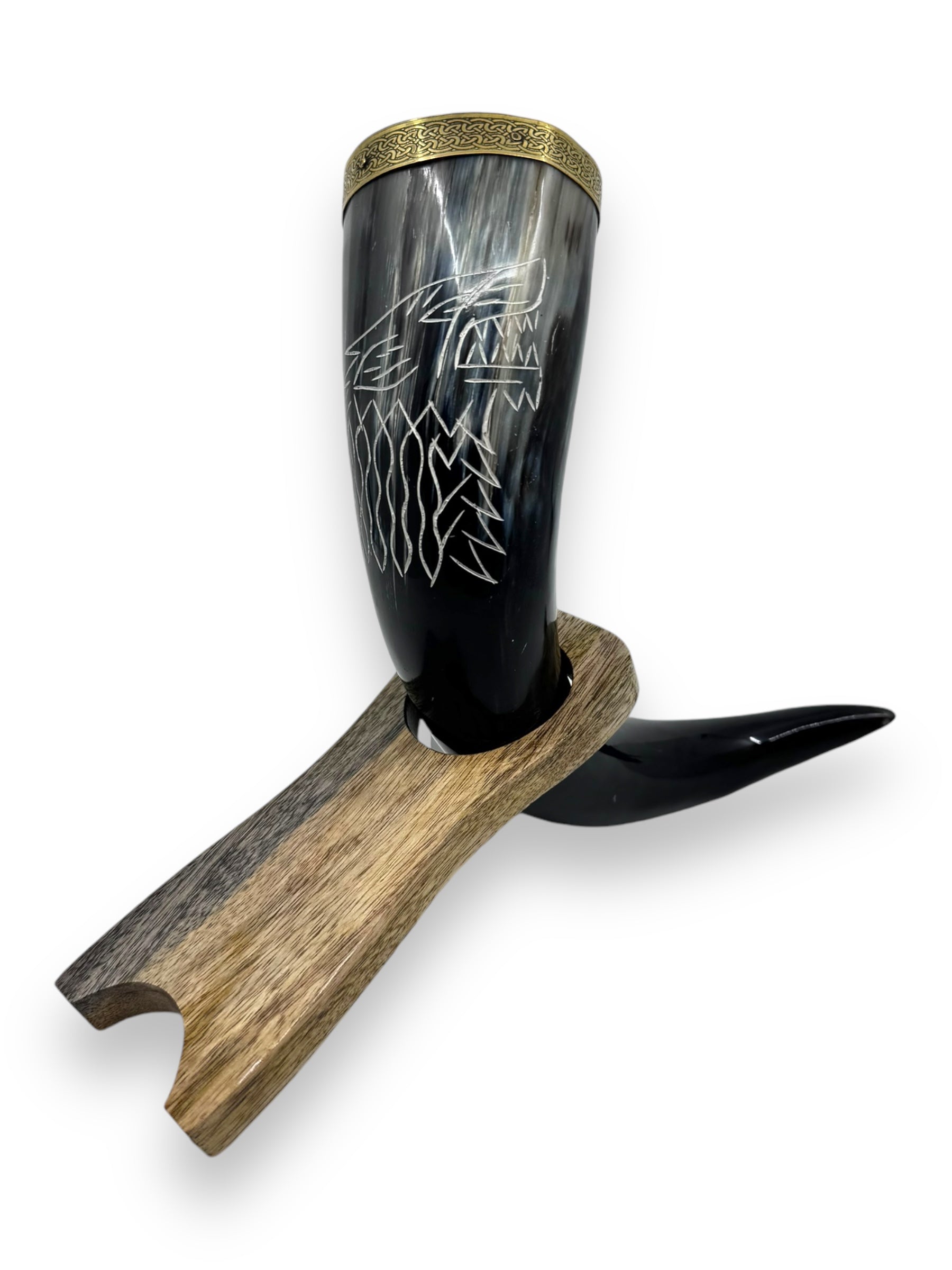 Viking Drinking Horn Fenrir featuring intricate carvings and a brass rim, elegantly displayed on a wooden stand.