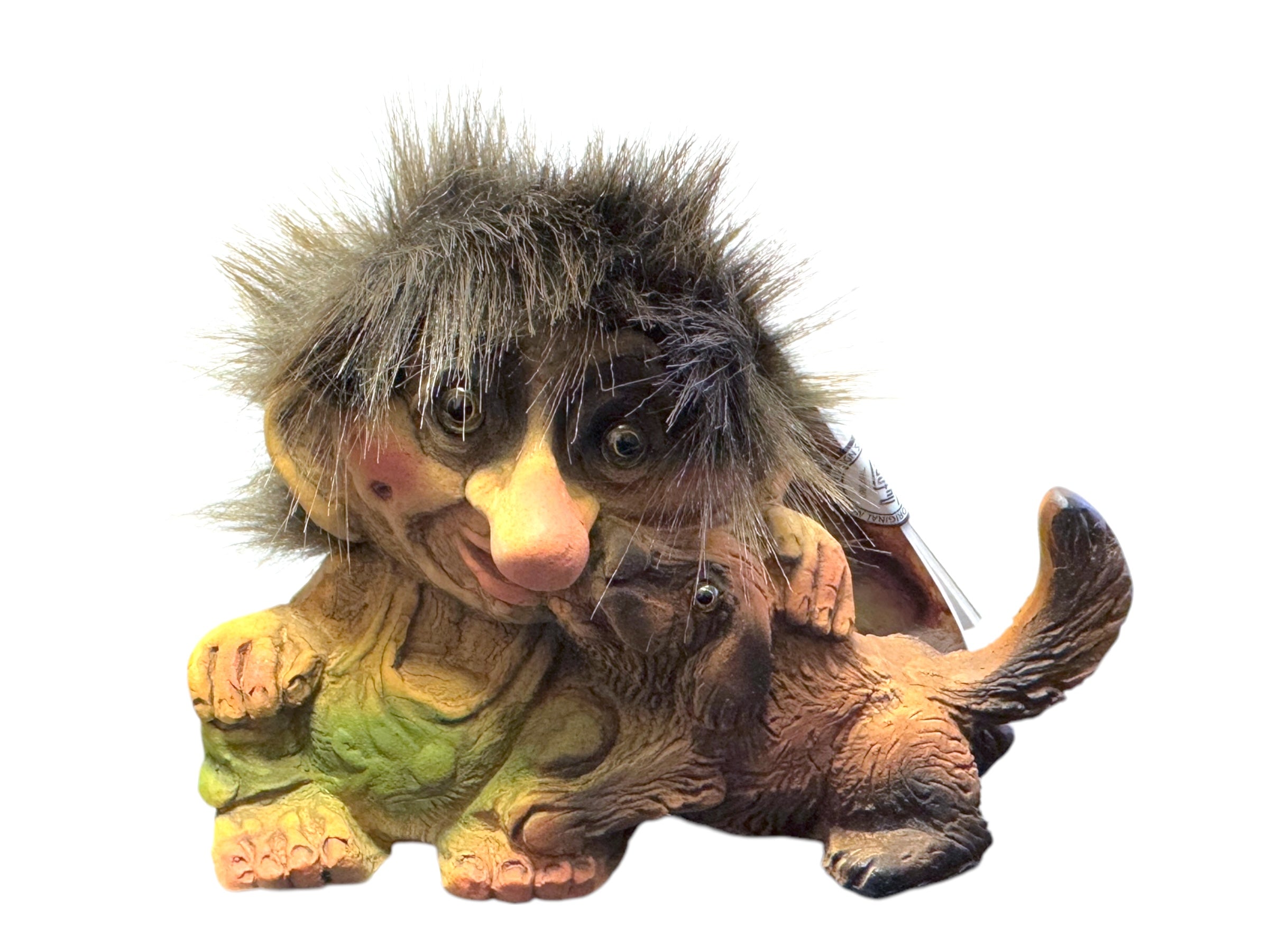 The NyForm Troll with Dog figurine features a whimsical troll with spiky hair hugging a brown dog, epitomizing handmade Norwegian design and charm.