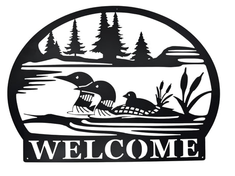 Welcome Loons Wall Decor in matte black metal (23 × 17) features three loons on a lake with trees and cattails, and WELCOME at the bottom—an ideal piece of Scandinavian-inspired art for your home.