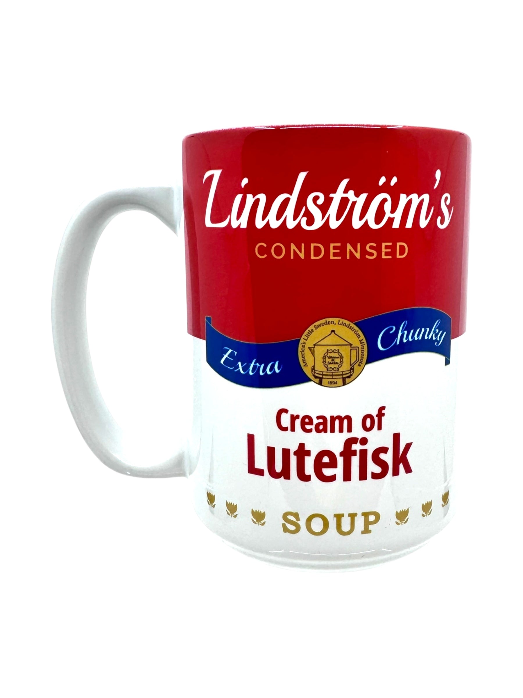 This 15oz ceramic mug embodies the iconic red and white canned soup label design, prominently featuring "Lindstrom's Cream of Lutefisk Soup" with bold lettering and blue accents. Drawing inspiration from the enchanting Vilhelm Moberg series, it playfully includes the phrase "Extra Chunky.