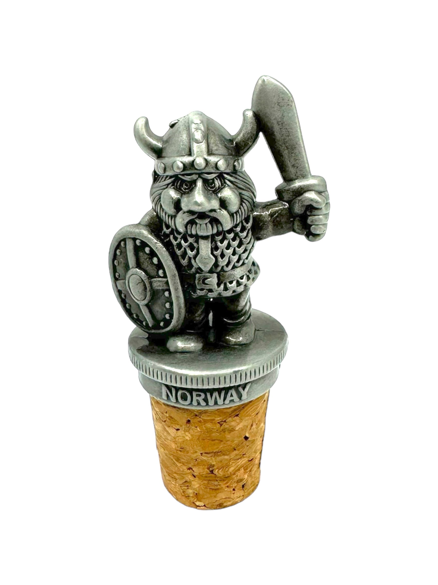 A Viking Pewter bottle stopper features a metal Viking figurine poised with a sword and shield, proudly standing atop its cork, adorned with the label "NORWAY.