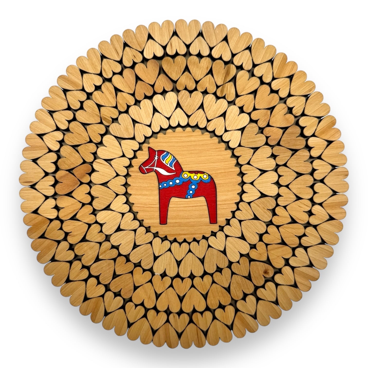 An 8-inch trivet named "Red Dala Horse with Hearts" features a circular arrangement of wooden heart shapes encircling a red painted horse in the center.