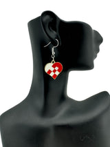 A mannequin head showcases the Danish Braided Heart Earrings, crafted from enameled metal in red and white Danish flag colors, dangling elegantly from hooks.