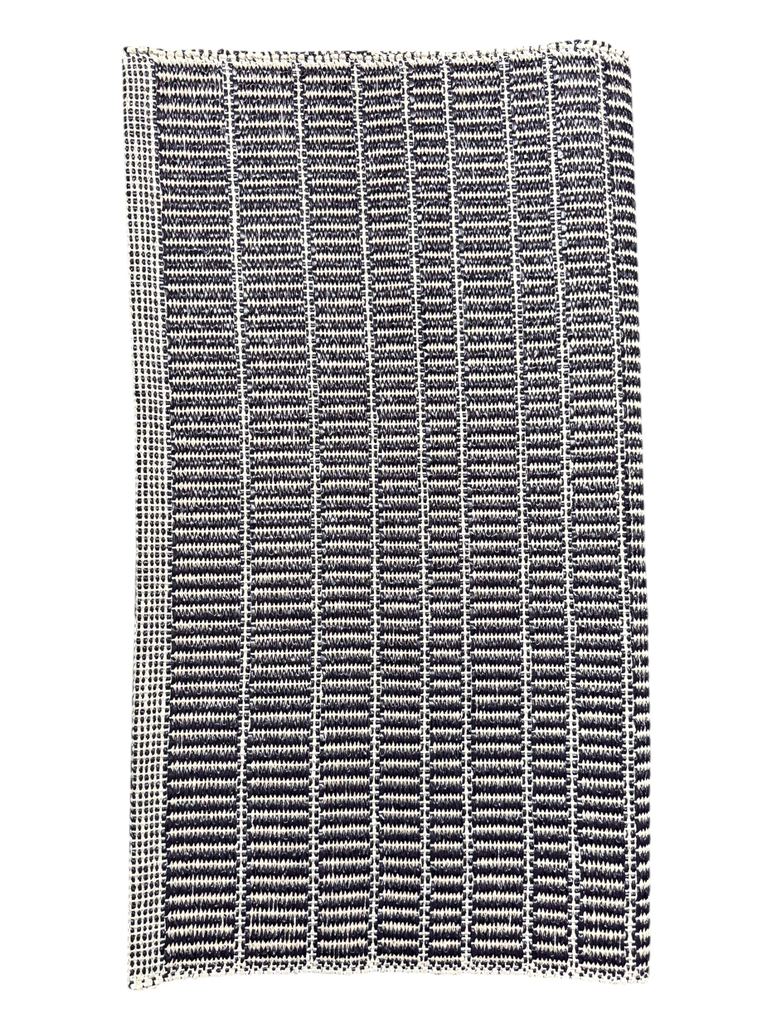 The Horredsmattan - Mai Vinyl Rug (28 x 60) features a rectangular black and white striped design with vertical lines, made from durable woven vinyl for a modern, stylish look.