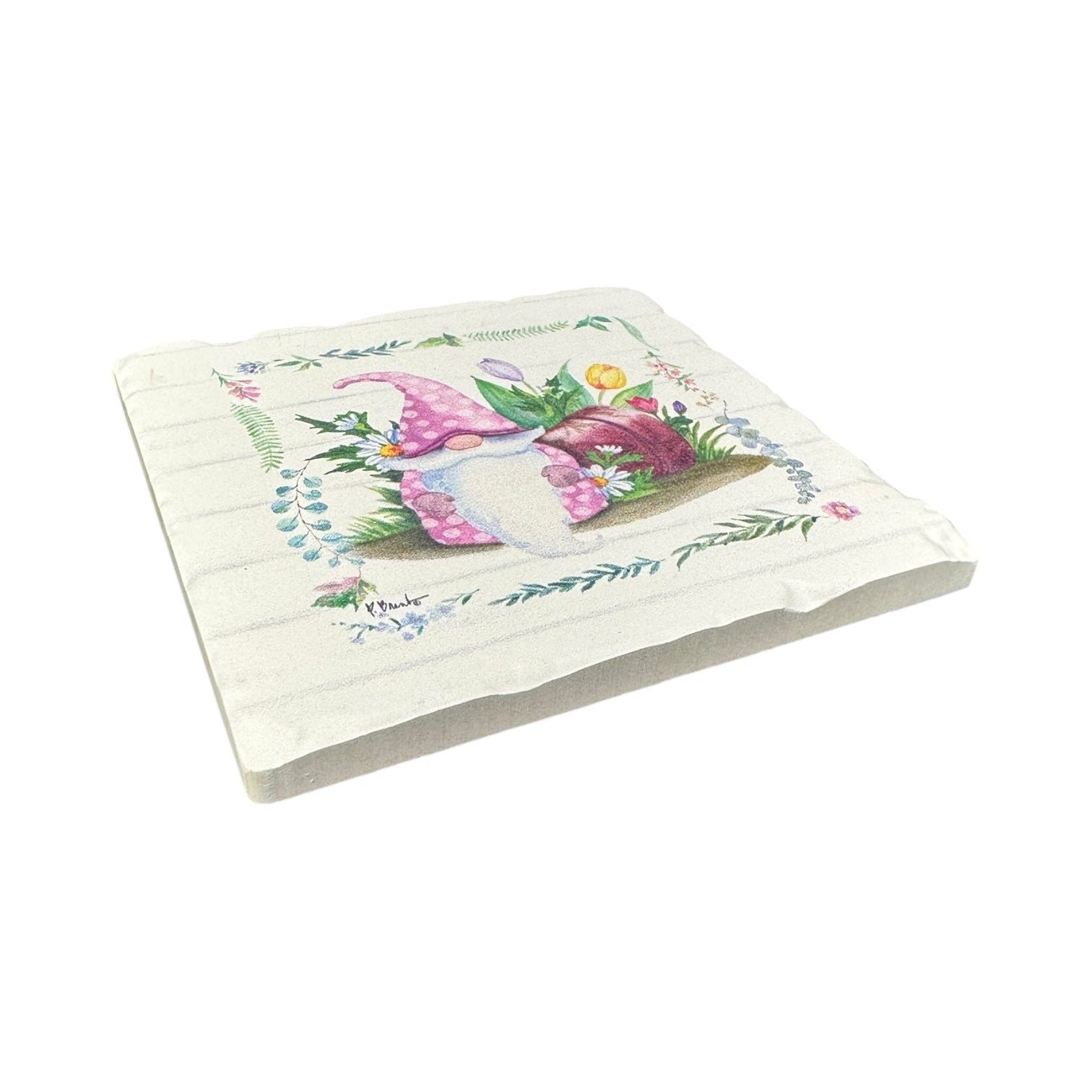 A square napkin with a gnome in a purple hat amid flowers and greenery on white adds rustic charm, pairing perfectly with Spring Gnomes Tumbled Tile Coasters in yellow, blue, green, or pink.