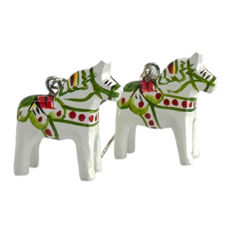 A pair of handcrafted Dala Horse White Earrings (2cm high), inspired by Swedish folk art, features green, red, and yellow patterns and is displayed side by side against a white background.