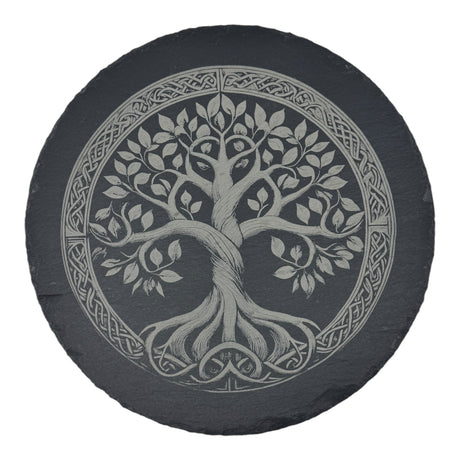 The Trivet: Tree of Life on 9.75 Slate Trivet features a circular slate design engraved with a stylized Tree of Life and an intricate Celtic knot border inspired by Norse mythology.