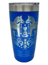 The Tumbler: Swedish Dala Horses - Blue 20oz Stainless Steel Tumbler features Nordic-inspired floral art, a silver Dala Horse, a stainless steel rim, and a slide-close clear plastic lid.