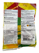 Back view of a Bubs Skalle - Sour Citrus Skulls (90g) package showing Fairtrade sugar, product details, ingredients, nutrition facts, and barcode in several languages.