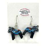 A pair of Dala Horse Black Earrings—handcrafted Swedish folk art (2cm/0.75 high) with blue, red, and white designs—displayed on a Grannas A. Olssons Hemslöjd AB branded card.