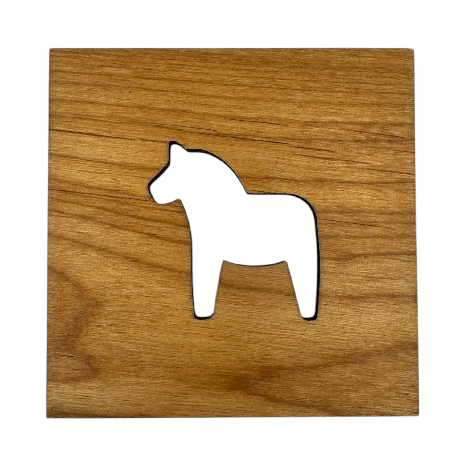 The Coaster: Swedish Dala Horse 4x4 Square Alder Coaster features a white silhouette of a Swedish Dala Horse cut out at the center of an alder wood square.