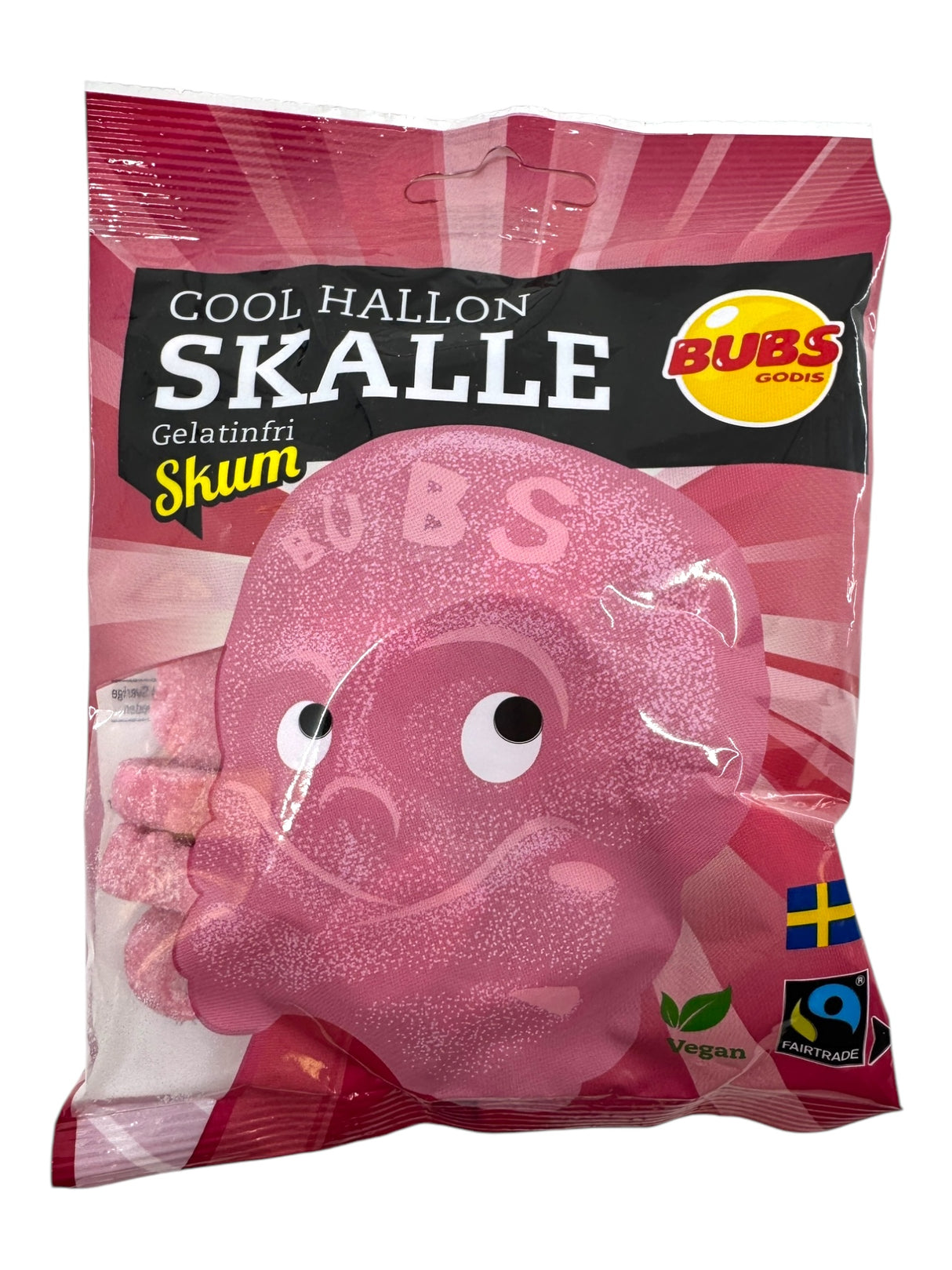 A 90g pack of Bubs Skalle - Sour Raspberry Skulls Cool Raspberry Foam, a gelatin-free vegan candy featuring Fairtrade certification and a large pink skull on the packaging.