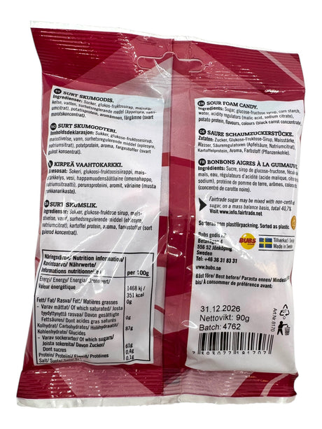 Back view of a 90g bag of Bubs Skalle - Sour Raspberry Skulls (Cool Raspberry Foam) candy displays ingredients, nutrition info, barcode, best before date, and recycling instructions in several languages.