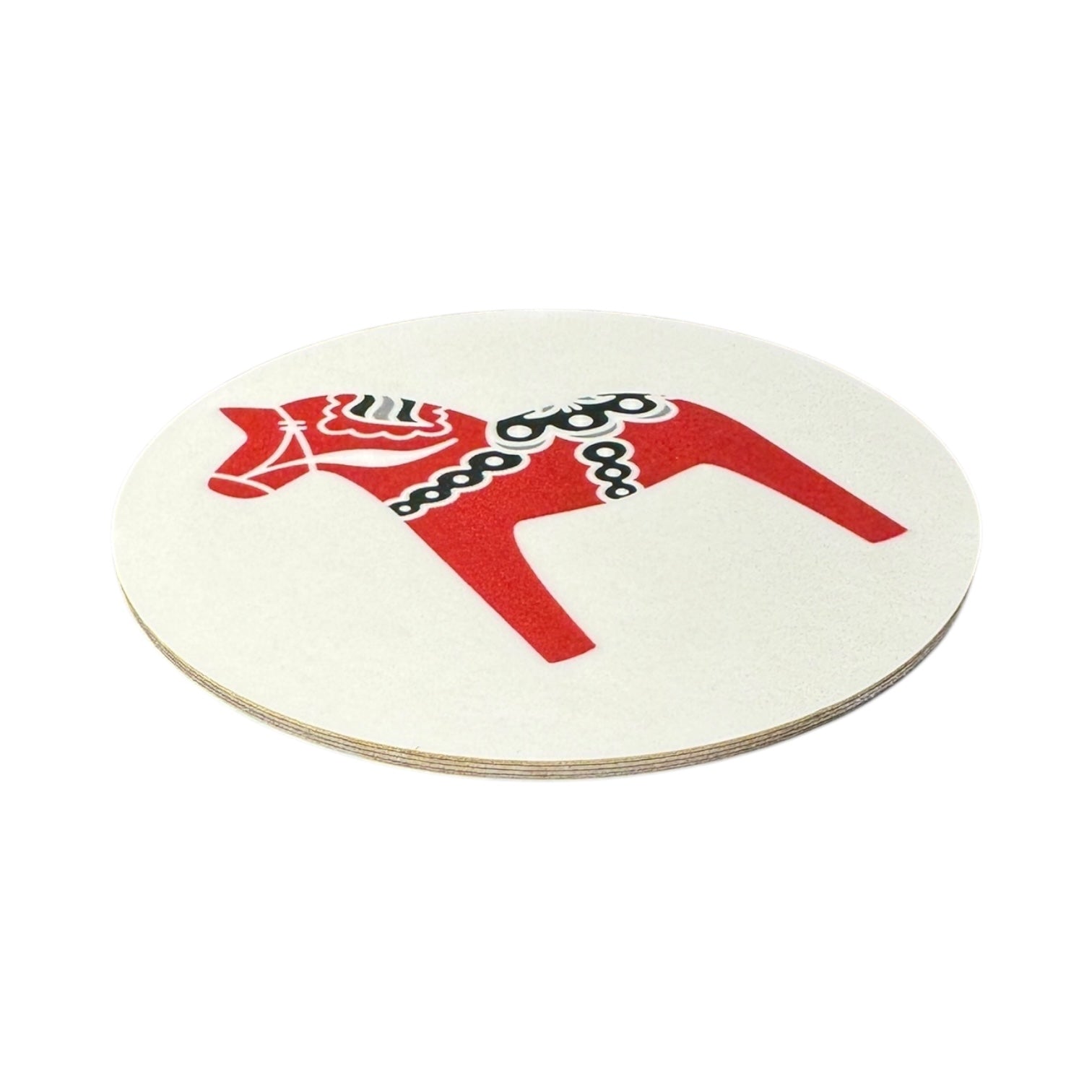 A round 3.5 white Dala Horse Coaster, shown at an angle with a red and black stylized horse design. Available in Black, Blue, Red, or Grey; made in Sweden.