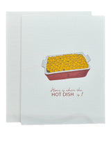 The Home is Where the Hot Dish Is! Card (4.25 x 5) features a white napkin design with a casserole dish illustration and text—perfect for any Minnesota occasion. Includes envelope, blank inside.