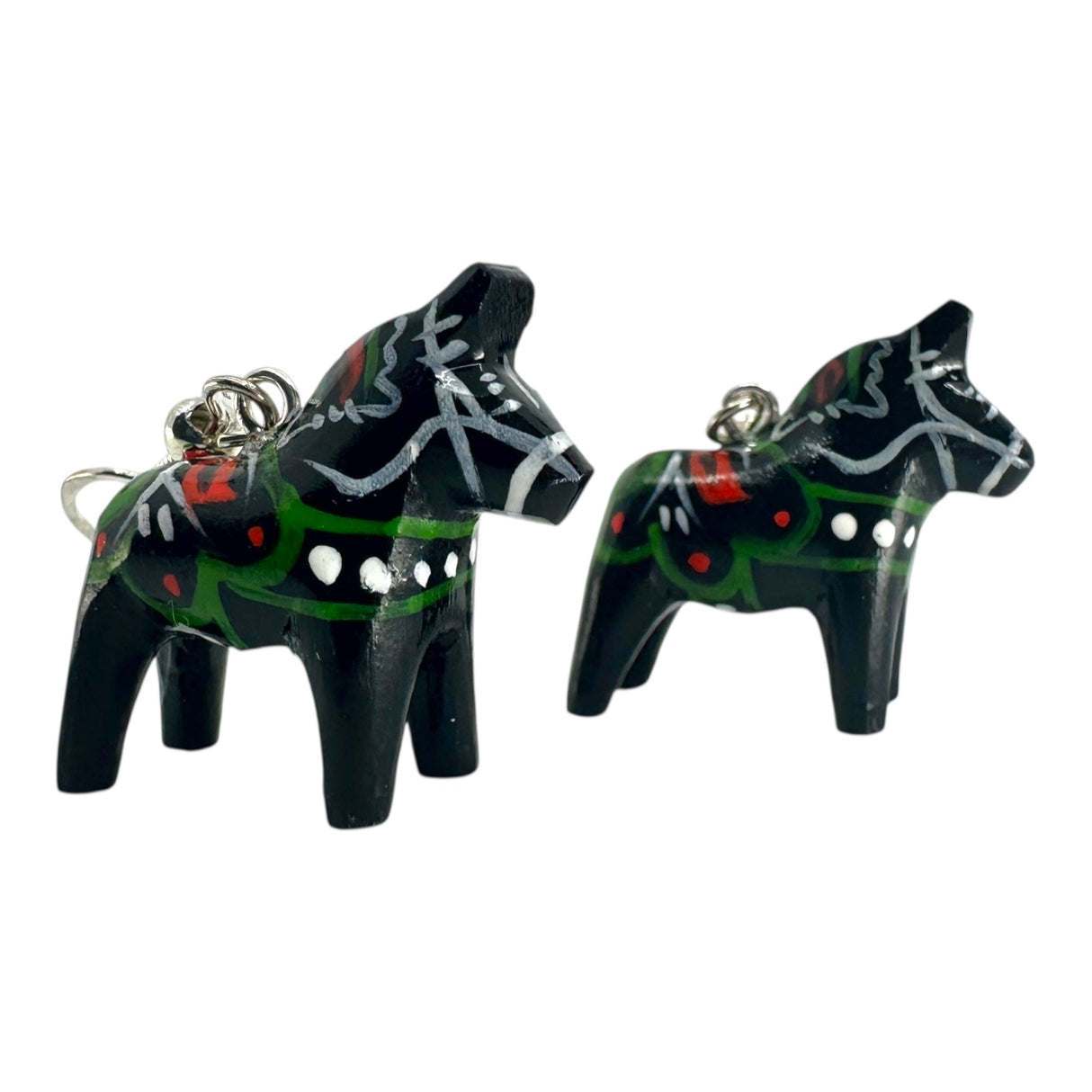A pair of small black Dala Horse earrings (2cm/0.75 high), handcrafted in Swedish folk art style with painted green, white, and red details.