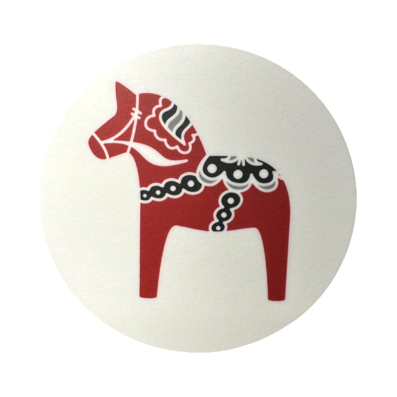 The Round 3.5 Dala Horse Coaster, shown here in red with black and white patterns on a plain white background, is made in Sweden and adds Swedish tradition to your multi-colored coaster collection. Available in Black, Blue, Red or Grey.