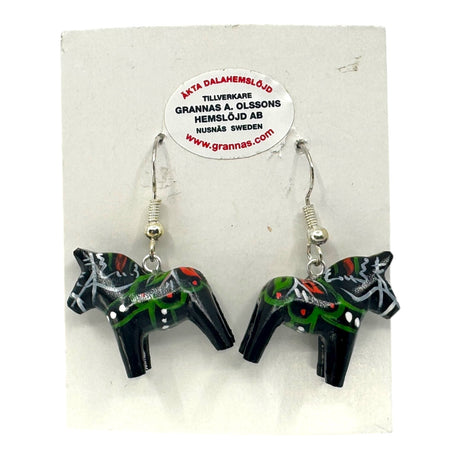 Handcrafted Swedish Folk Art Dala Horse Black Earrings (2cm/0.75 high) with green and red accents, displayed on a Grannas A. Olssons Hemslöjd AB, Sweden white backing card.