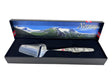 A smooth Norwegian cheese slicer with a pewter handle featuring Viking ship and moose images comes boxed, highlighting Nordic heritage.