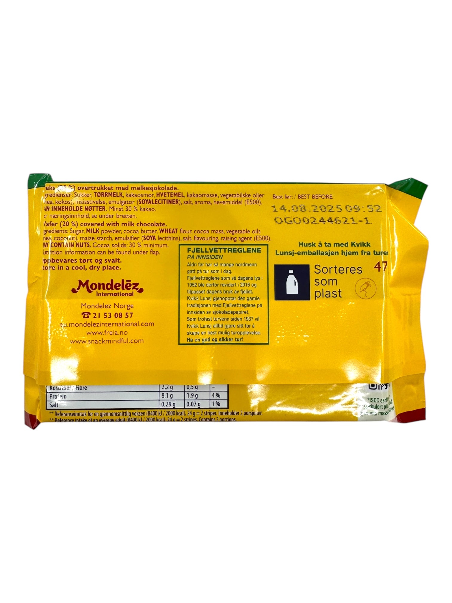 Back of a yellow 47g Freia Kvikk Lunsj (Norwegian for Quick Lunch) candy package showing nutritional info, contact details, recycling instructions, barcode, and expiry date in Norwegian for this classic milk chocolate wafer.