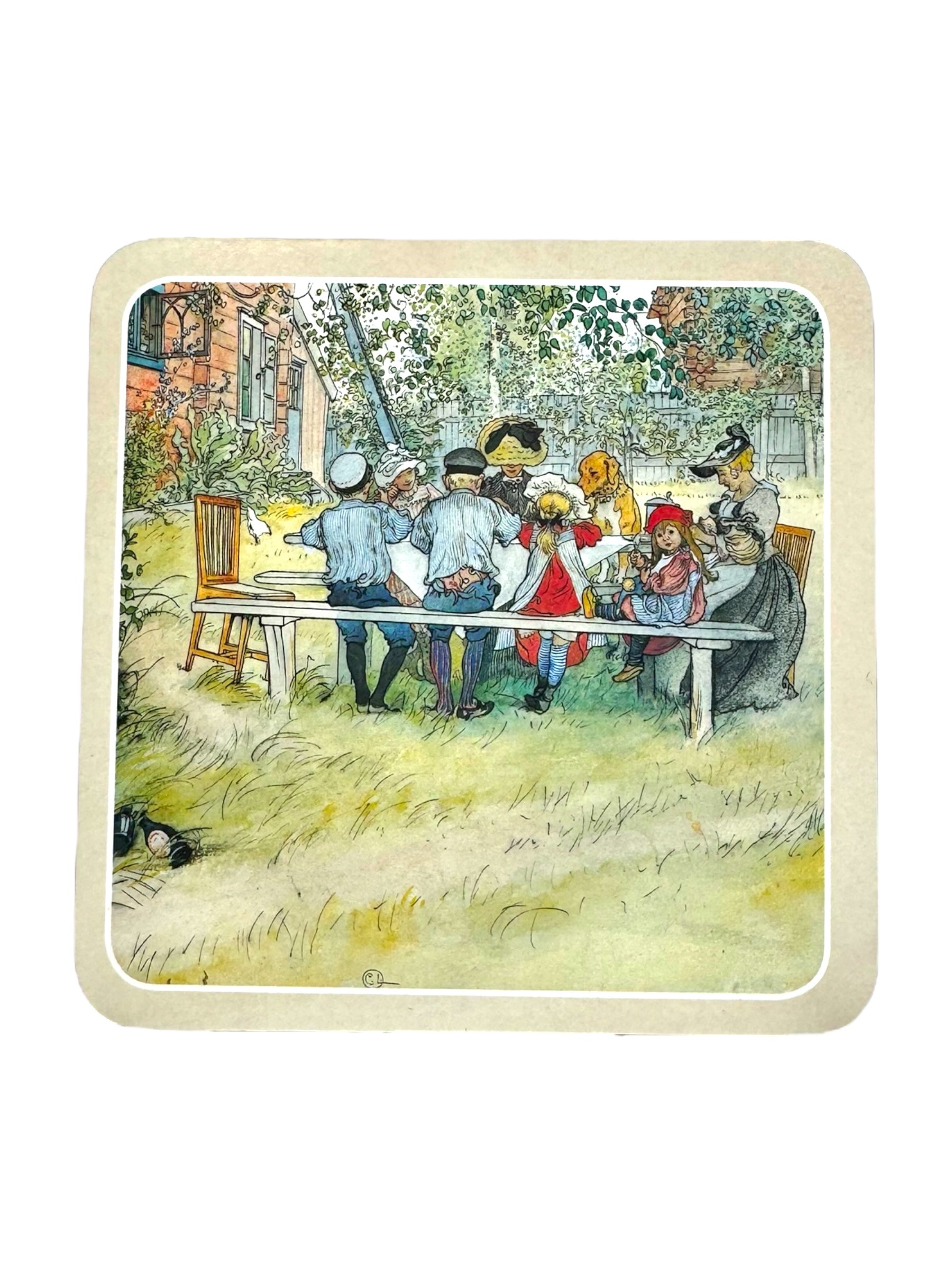 Children in period clothing are gathered around a long outdoor table in a garden, evoking the style of Carl Larsson's artwork. Some children sit while others stand, all framed by trees and a quaint brick house. This delightful scene embodies timeless moments perfect for adorning with the elegance of the Coaster: Carl Larsson.