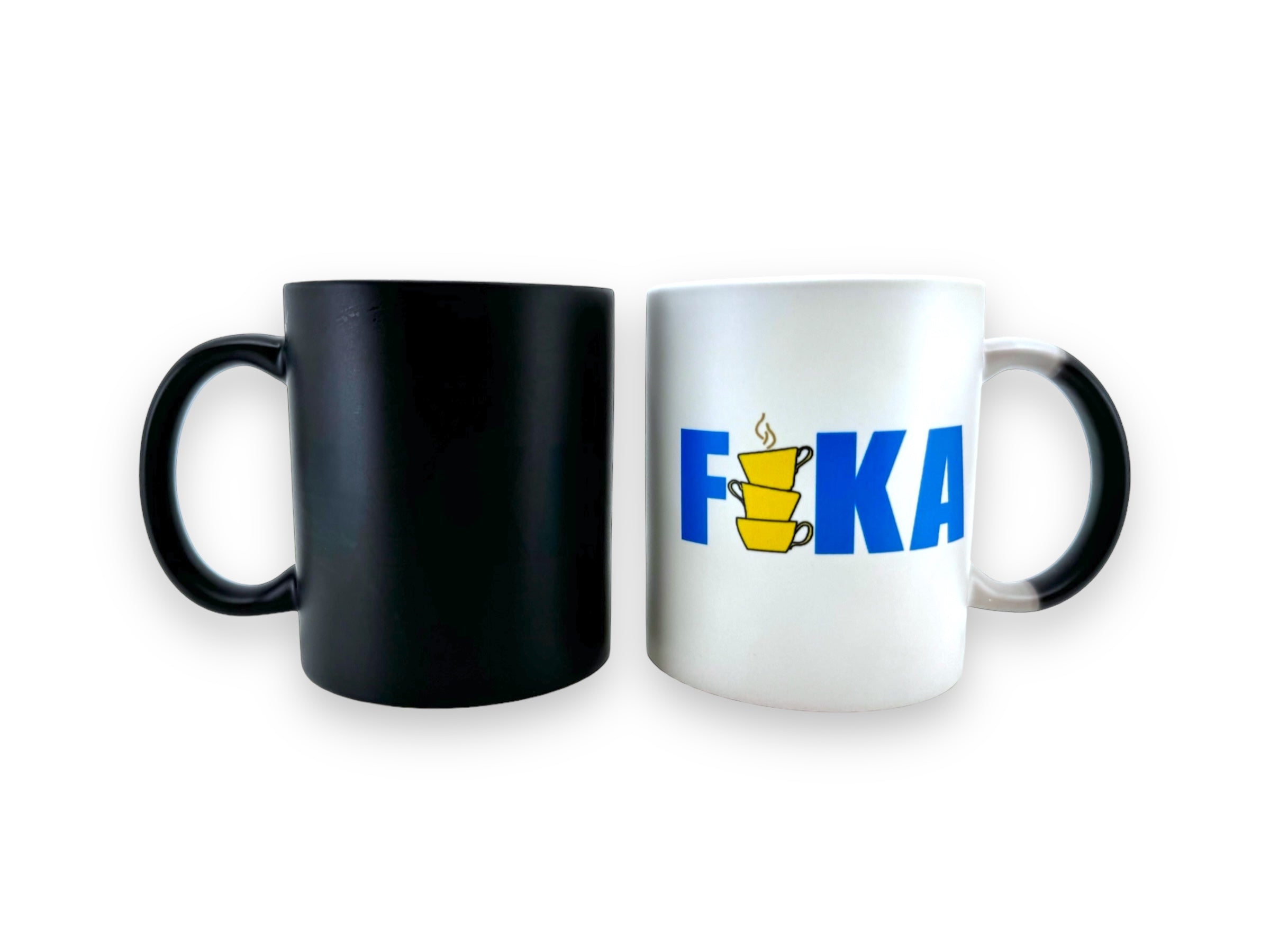 Side by side are two mugs: one is black, and the other is a thermal color-changing mug featuring "FIKA" in blue with a yellow cup graphic as the letter "I.