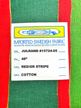 Label on luxurious fabric: Crafted from Imported Swedish Fabric, Style: JULRAND #15724-05, Size: 48, Color: Red/Gr Stripe. This Cotton Table Runner design, known as the Julrand Holiday Runner, showcases a vivid background adorned with stripes in red, green, and yellow.