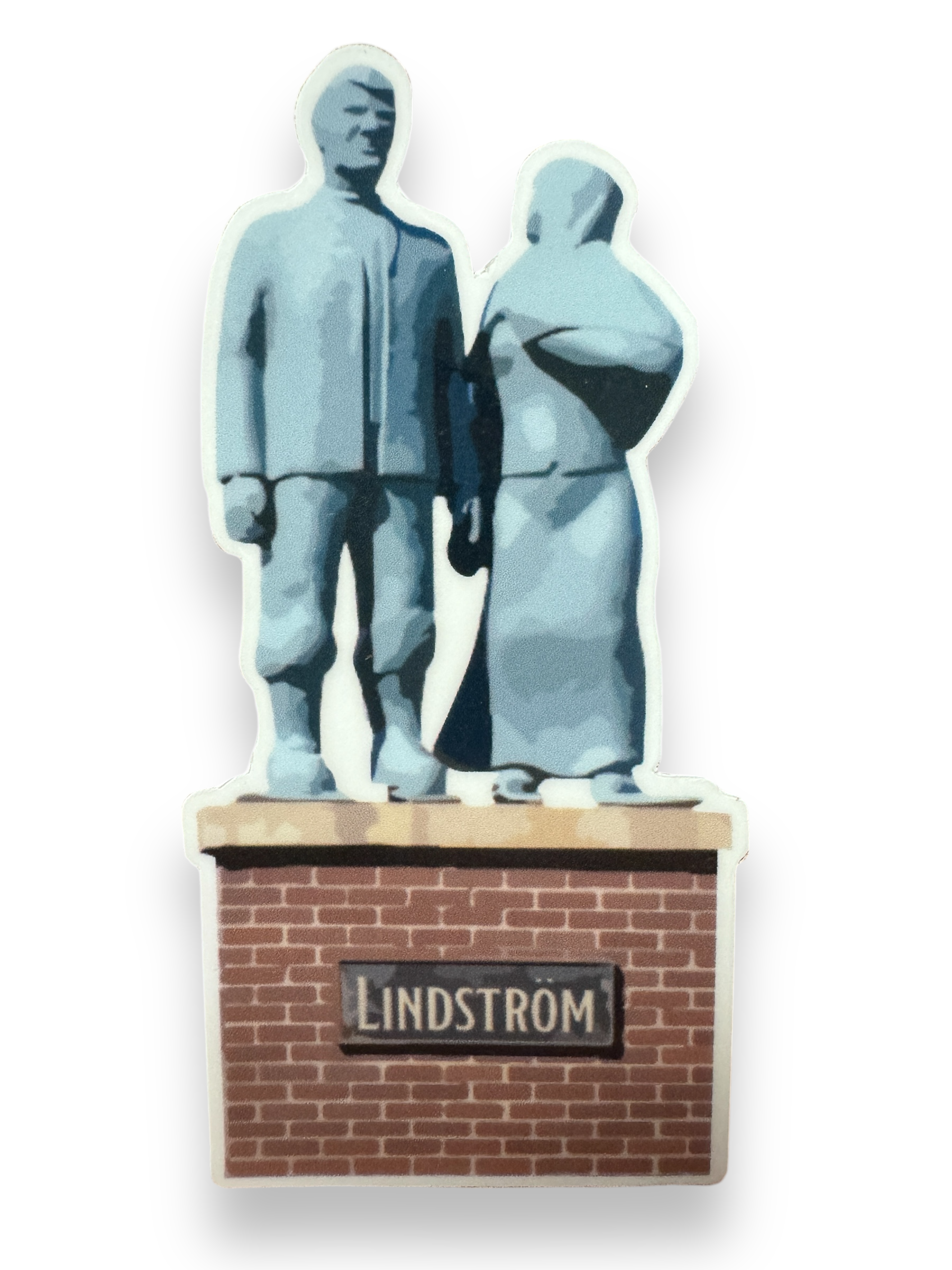 The Karl Oskar & Kristina Statue Sticker showcases intricate details of statues depicting a man and woman on a brick base labeled Lindstrom, rendered in the 3.5 in x 1.75 in decal design.