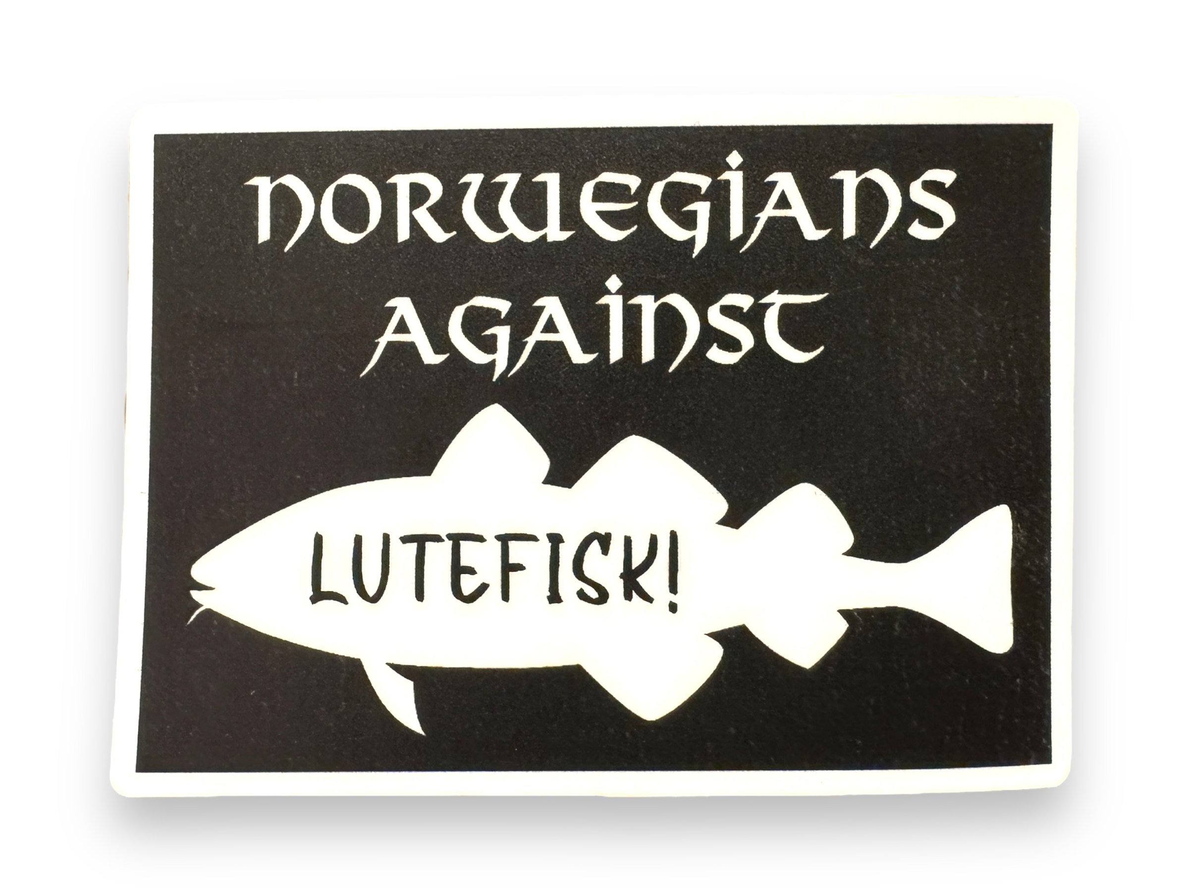 The Sticker: Norwegians Against Lutefisk showcases bold text over a fish silhouette against a sleek black backdrop.