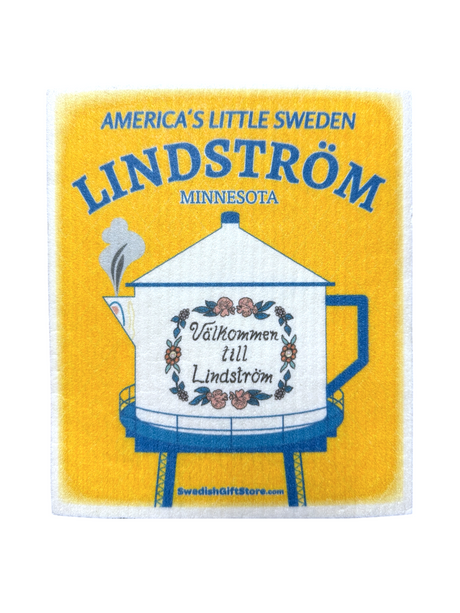 Brighten your kitchen with the Lindström Water Tower dishcloth in sunny yellow, featuring “Välkommen till Lindström” and “America’s Little Sweden, Lindström, Minnesota.” Eco-friendly and full of Swedish charm!.