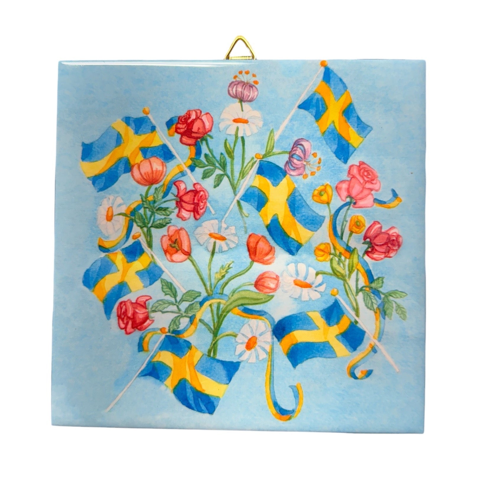 The Tile: Swedish Flags & Flowers Ceramic Tile – 6" features Swedish flags and colorful flowers on a light blue background, with cork backing and a brass hanger—ideal for Scandinavian-inspired floral decor.