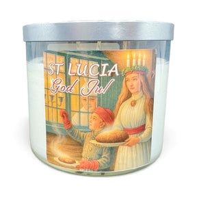 A Candle: Saint Lucia featuring a label with St. Lucia and a child holding bread, and "St Lucia God Jul" on the front.